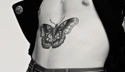 Worldstyles: “The Butterfly On His Torso Is Based On And Old French Prison Tattoo