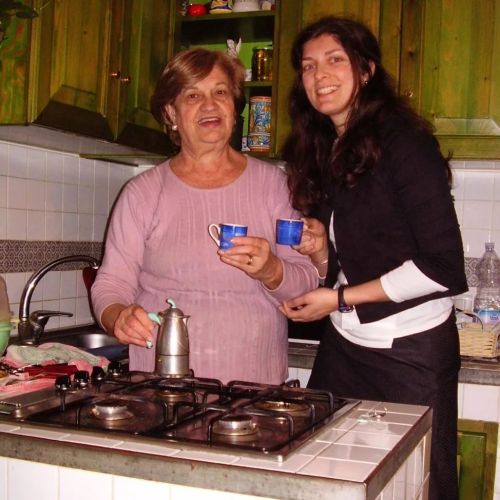 Tanina and I in her kitchen in 2007, having “a moment.” That is, an espresso together. B