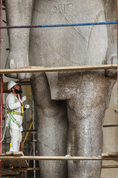 speciesbarocus:Restoring a statue of Ramses II at the Atrium of the Grand Egyptian Museum, 2018.>