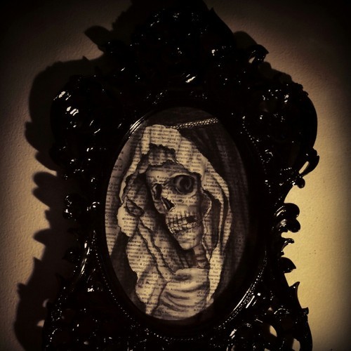 beautymarkings:  Framed and listing on etsy now. ฮ. Original graphite and charcoal illustration on an aged encyclopedia page in a black ornate oval frame. https://www.etsy.com/listing/156310735/la-mort