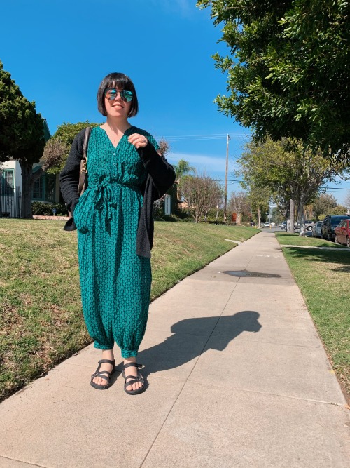 jumpsuit: anthropologie // sweater: brandy melville // shoes: skechers // sunglasses: gentle monster