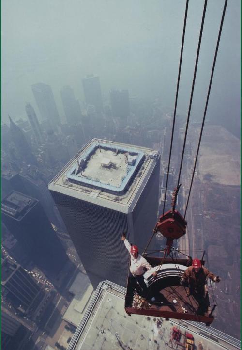 nycnostalgia:historium:Ironworkers from Local 40 build the World Trade Center antenna in New York, 1