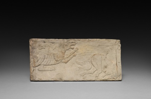 Relief with Rampant Tiger and Boar from a Funerary Stove Model, 206 BC- AD 220, Cleveland Museum of 