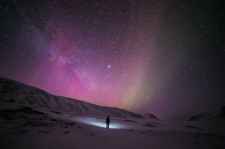 wordsnquotes:  culturenlifestyle:Arctic Starry SkyFinnish artist Tiina Tormanen captures the van of snow Arctic landscapes in her project, Wanderer. In each image a faraway unknown silhouette is seen in the middle of the deserted landscape observing