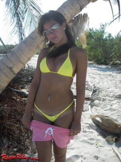 beachdancer:  Sexy girl showing her great body in a yellow wicked weasel bikini