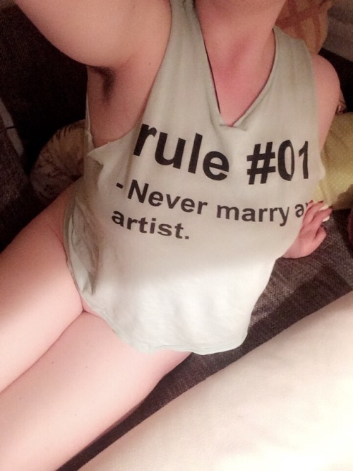lovelystray: me, lying on my sofa wearing an ironic tank top sipping a glass of dessert wine: avatar