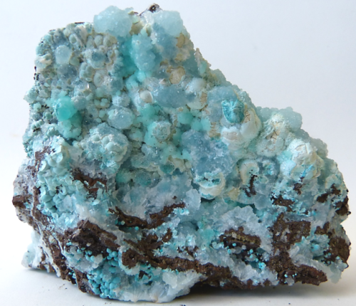  ROSASITE (Copper Zinc Carbonate) and HEMIMORPHITE from Chihuahua, Mexico. Blue spheres of rosasite 