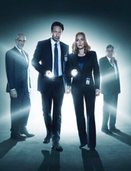 xfiles-behind-the-scenes: Mulder and Scully. Back with their flashlights. Everything is right in the