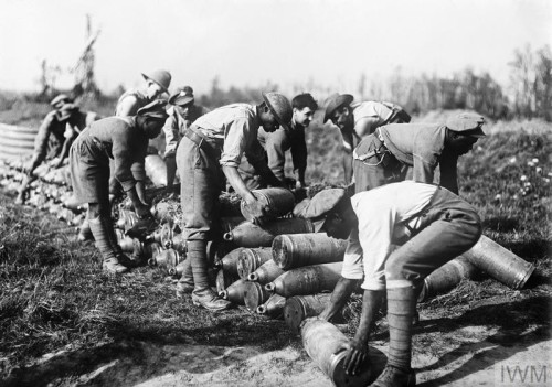 Men from the West Indies, Australia and New Zealand stack shells near Ypres (Belgium, October 1917).