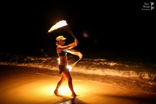 hoopyinhawaii:  Not hooping related I love this shot of Kiki, she’s illuminated by the poi by 