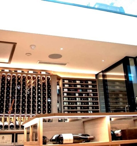 Wine Cellar Medium KentMid-sized Country Wine Cellar Photo With Storage Racks
