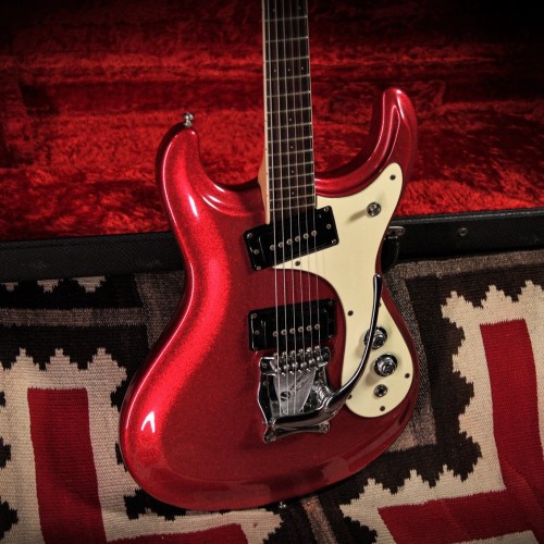  1966 Mosrite Ventures Model in Red Sparkle from:  www.rumbleseatmusic.com/ 
