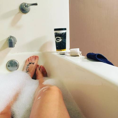 wheelerj010:Current mood #pureromance bubbles and #thatsnotcoffee in my @packers cup #bubblebathsare