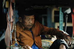 An old becak peddler rests. Bandung, Indonesia
