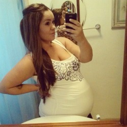 fatandbeautyful:preggogirl:How cute is she   pregnant woman are generally quite hott but this one mmmhmmm indeed