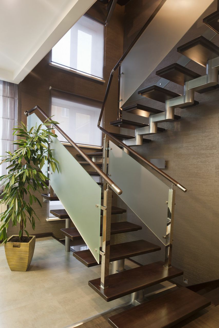 homestratosphere:  A modern staircase with frosted glass railing panels and floating