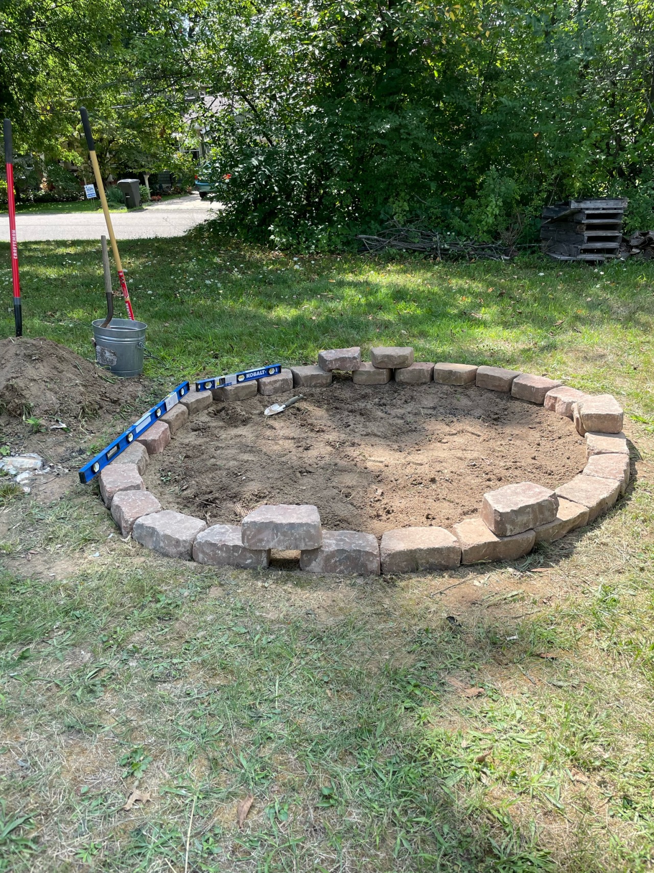 Worked on the fire pit today, mostly level except for the end( used the level the whole circle anddd it’s not level to the beginning of the circle🙄🤦🏼‍♂️) then mowed the lawn. Was a good productive day🤘🏼