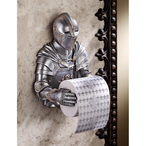 sixbucks:  stuft:  A Kinght to Remember Gothic Bath Tissue Holder (typo not mine) These days knights don’t have enough to keep them occupied I guess.  