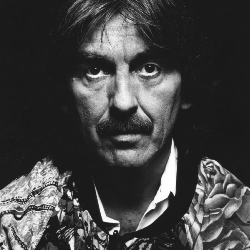 George Harrison, 1992; photo by Nigel Parry.“I hadn’t written a tune in a while, and ‘Blow Away’ [re