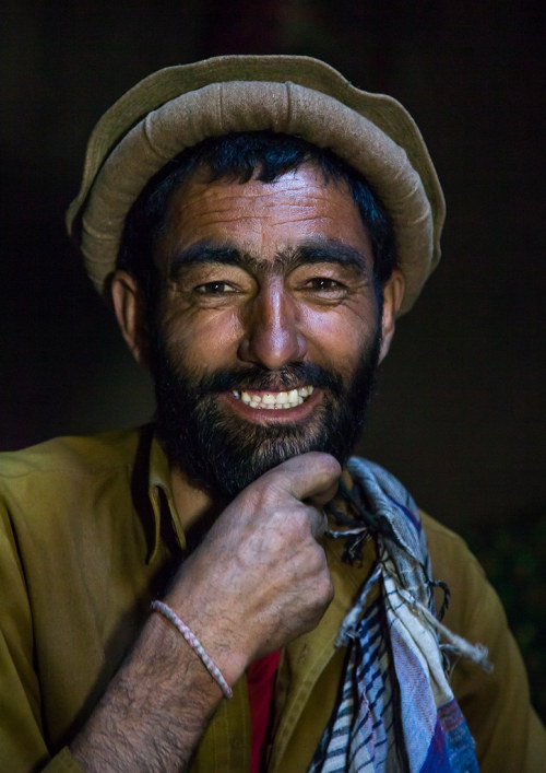 Portrait of an afghan man smiling, Badakhshan province, Khandood, Afghanistan. Taken on August 14, 2