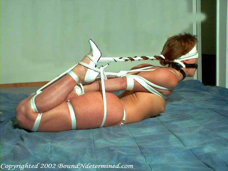 bondagethings:  Hogtied tightening