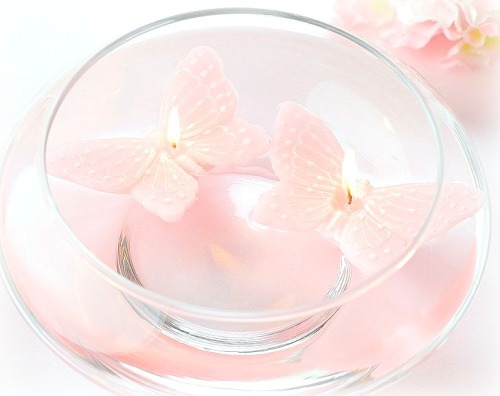 sapphicshimmers:Pink butterfly floating candles ~ (photo credit) ^My edit - please do not remove the
