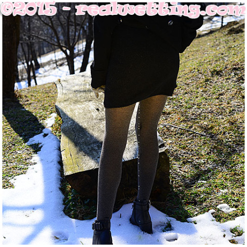 Wetting in short - tight wool dress and thick gray pantyhose in the snow.