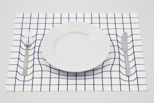 langste:  Japanese design studio A.P.Works playfully mimics the imagery of Albert Einstein’s space-time fabric theory with this mind-bending placemat. 