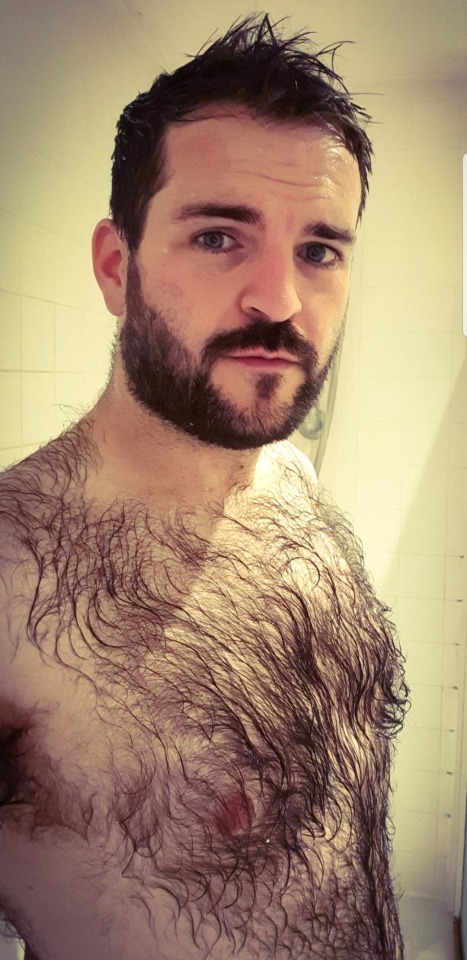 yummy1947:andy9483:Such a handsome bear as his tidy beard, moustache and beautiful eyebrows add to his good looks. His body hair is awesome. With hair growing on his shoulders and merging with his magnificent wet hairy chest and furrry belly, he looks