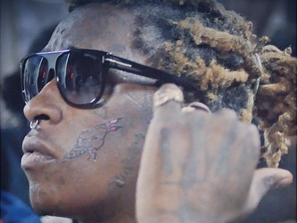 xv7:  centralflsavage:  young thug got a ice cream cone tattoo to honor Gucci  this