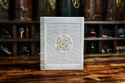 alexlibris-bookart: The book cover bound in white leather with deep embossed pattern and gilded titt