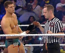 jasindarkblood:  ♥ the ref cant stop looking at Cody’s Huge Bulge ♥