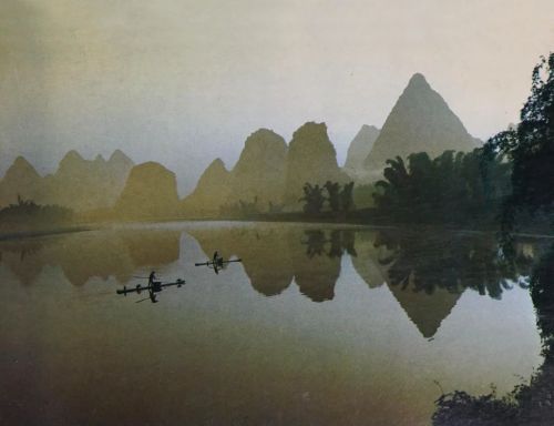 equatorjournal:  Boats floating a top green hills, 1984. Photo by Bai Liang.  From “Guilin shan shui / Hills and rivers of Guilin”, 1988.https://www.instagram.com/p/CmzVLuHNEOe/?igshid=NGJjMDIxMWI=