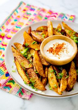 ladyinterior:  Spicy Potato Wedges with Lime Dipping Sauce  yum