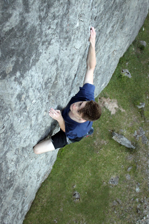 wetheparttimersuniverse:Matt Pownall warming up at ‘Trevor Rocks’ with his Onsight of ‘Checkpoint Charlie 6b’A weird picture where the belayer seems to have vanished, hopefully he hasn’t pulled a runner, for Matt’s sake.