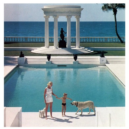 “Guest and her son in front of the Grecian pool, 1955″via @growlmama