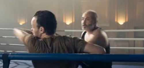 bears-muscle-boxing: A young punk comes into a boxing gym and ridicules an older man training in the