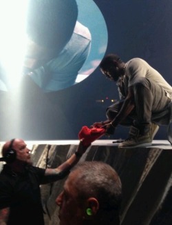 marquisarmani:  kimkanyekimye:  Kanye signing a fan’s Red Octobers tonight #YeezusTour 2/23/14   I experienced this act of greatness.