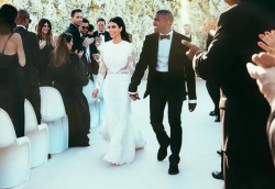 vgypsy:  urculture:  True love at it’s finest. Congratulations Kanye and Kim.  Am I the only one who wasn’t took impressed by Kim’s gown? I mean the wedding looks beautiful and everything and I wish them luck on their marriage but I definitely expected