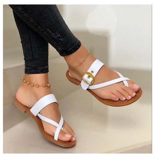 sandalsandspankings:  Pretty feet in white toe cross sandals.