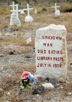 sixpenceee: This headstone was spotted in Goldfield, Nevada. (Source)  I&rsquo;d really like &ldquo;died eating library paste&rdquo; to be my epitaph as well.