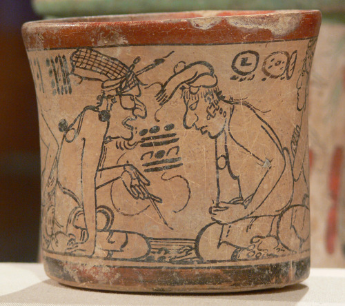 Mayan codex-style vessel, showing the deity Pauahtun instructing two scribes.  Artist unknown (Mexic