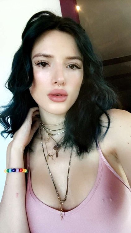Bella thorne when I was younger she stole my heart but she transformed in to a selfie standard bitch and now.   Now she is back stealing my heart again! Omfg so hot  (Even if this style is temporarily)