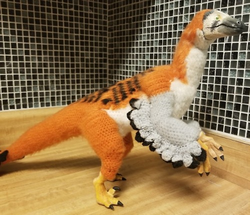 asleepymonster:Velociraptor doll made from sculpy and crocheted parts. It’s coloration is base