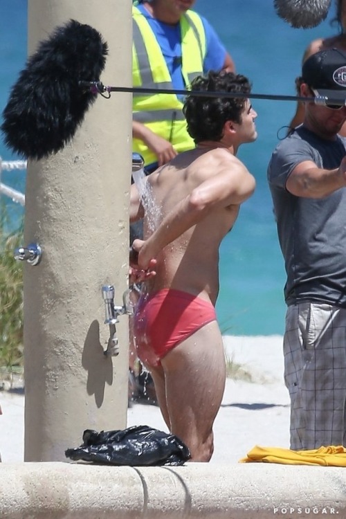 celebritybodybuge:  Darren Criss Part 1 Darren Criss in a red speedo as Andrew Cunanan on the set of The Assassination of Gianni Versace; American Crime Story.