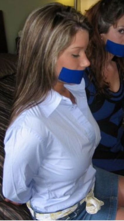 kiltedpatriot:  tyher69:mmpphhmmpphh:The babysitter bandit has struck again   I’m sure I’ve already posted this, but it deserves a second go-around.  Enjoy! Taking the blue tape-gagged blonde & brunette, 8th pic. :D@gaggingthings777 chooses Chloe