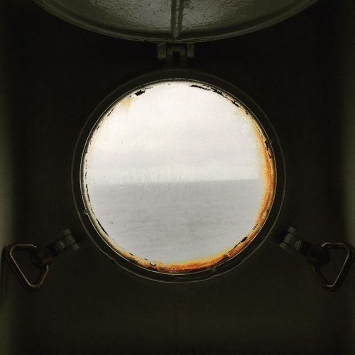#Stranded Day 33 - Captain was right about the weather. Woke up and looked out my porthole to a grey