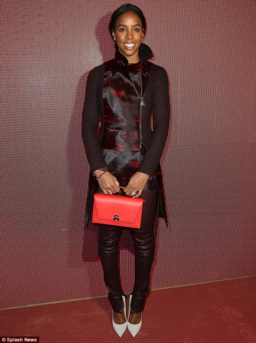 missladylove20:  Kelly Rowland sports form-fitting leather at the Akris Paris Fashion Week showFormer Destiny’s Child star Kelly Rowland and front-row regular Olivia Palermo certainly didn’t disappoint as they led the celebrities at Paris Fashion