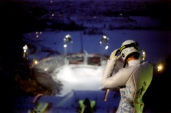 Liveolympic:  Norwegian Ski Jumper Stein Gruben Prepares His Descent With The Olympic