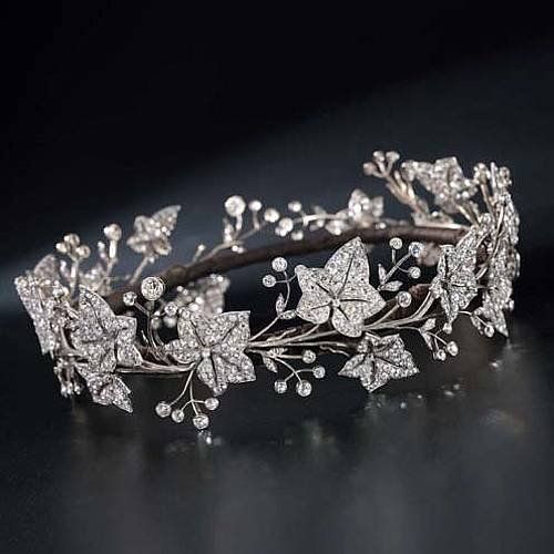 treasures-and-beauty:  A fine 19th century diamond tiara, by Garrard & Co., designed as  a full circle of old-cut diamond ivy leaves, with diamond single-stone  collet berries, mounted in silver and gold, the seven principal leaves  detachable for